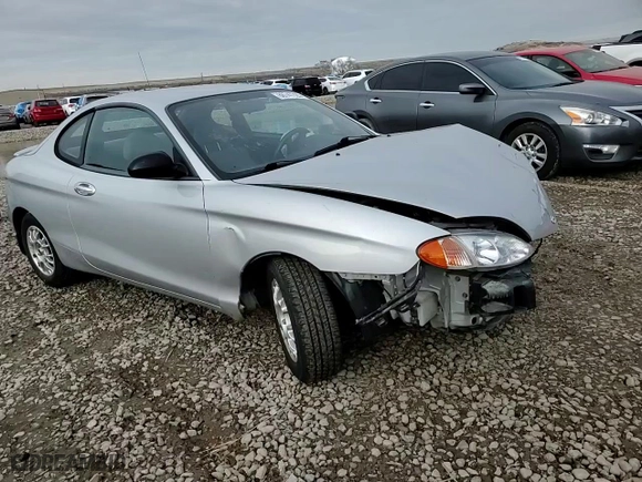1999 Hyundai Tiburon with VIN KMHJG24F8XU126762, listed as a Copart auction lot 88747725 with 51,296 mi miles and Salvage Title. Bid and sale history available at carsss.com. Image 11.