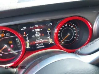 2021 Jeep Wrangler Unlimited Sahara with VIN 1C4HJXEN8MW622359, listed as a IAAI auction lot 42328958 with 100,450 mi miles and . Bid and sale history available at DreamBid. Image 7.