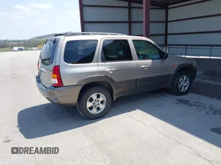 2002 Mazda Tribute LX with VIN 4F2YU08132KM26681, listed as a IAAI auction lot 42032230 with 273,155 mi miles and . Bid and sale history available at DreamBid. Image 4.