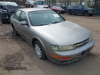 1999 Nissan Maxima GXE z VIN JN1CA21D7XT207262, wystawiony jako IAAI lot #41926037 z przebiegiem 45 516 mil mil oraz . Historia ofert i sprzedaży dostępna na DreamBid. Obrazek 1.