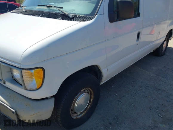 1999 Ford Econoline Cargo with VIN 1FTRE1421XHB21609, listed as a IAAI auction lot 42070347 with 103,104 mi miles. Bid and sale history available at carsss.com. Image 16.