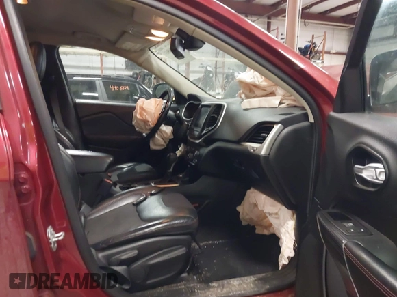 2015 Jeep Cherokee Trailhawk with VIN 1C4PJMBS7FW646577, listed as a IAAI auction lot 41404911 with 85,343 mi miles and . Bid and sale history available at DreamBid. Image 5.