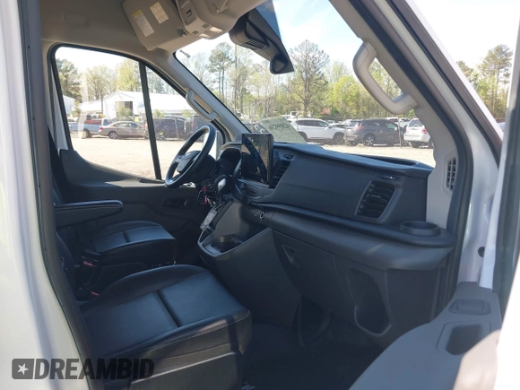 2022 Ford Transit Cargo with VIN 1FTBW3X80NKA69156, listed as a IAAI auction lot 42059236 with 100,096 mi miles and . Bid and sale history available at DreamBid. Image 5.