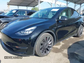 2021 Tesla Model Y Performance with VIN 5YJYGDEF1MF092889, listed as a IAAI auction lot 42076715 with 48,373 mi miles and . Bid and sale history available at DreamBid. Image 20.