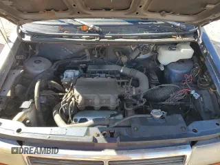 1992 Dodge Caravan z VIN 2B4GH2535NR705117, wystawiony jako Copart lot #77091264 z przebiegiem 174 008 mil mil oraz Szkody całkowita. Historia ofert i sprzedaży dostępna na DreamBid. Obrazek 12.