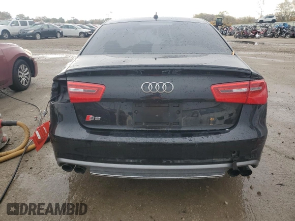 2014 Audi S6 Prestige z VIN WAUF2AFC6EN101479, wystawiony jako Copart lot #77700524 z przebiegiem 104 652 mil mil oraz Szkody całkowita. Historia ofert i sprzedaży dostępna na DreamBid. Obrazek 6.
