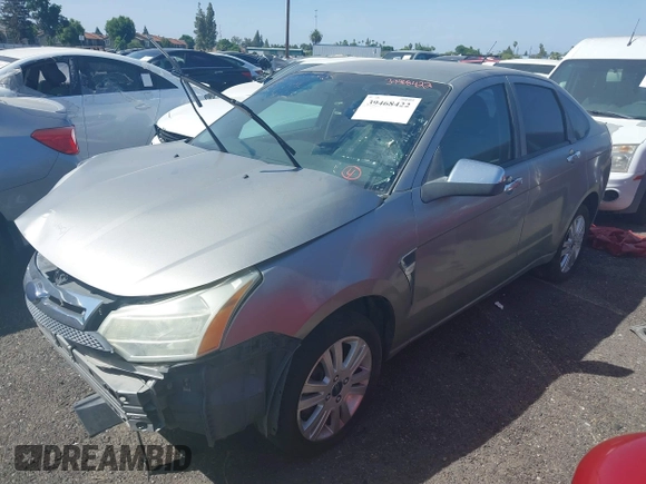 2008 Ford Focus SE with VIN 1FAHP35N88W242103, listed as a IAAI auction lot 39468422 with 169,911 mi miles. Bid and sale history available at carsss.com. Image 2.