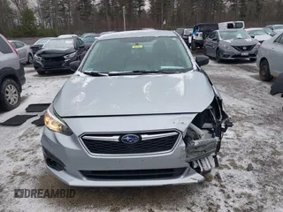 2019 Subaru Impreza with VIN 4S3GKAA60K3601427, listed as a IAAI auction lot 41845403 with 59,373 mi miles and . Bid and sale history available at DreamBid. Image 6.