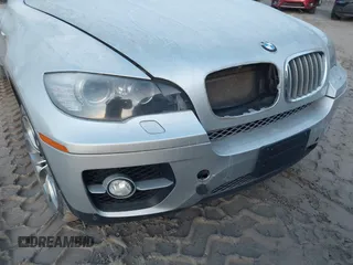 2012 BMW X6 50i z VIN 5UXFG8C58CL590171, wystawiony jako IAAI lot #41087730 z przebiegiem 83 143 mil mil oraz . Historia ofert i sprzedaży dostępna na DreamBid. Obrazek 6.