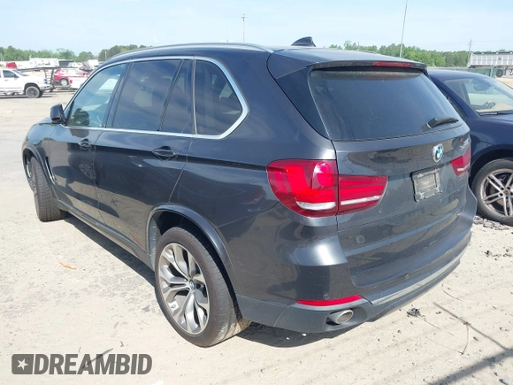 2014 BMW X5 xDrive35d with VIN 5UXKS4C57E0J93982, listed as a IAAI auction lot 42085173 with 169,908 mi miles. Bid and sale history available at carsss.com. Image 3.