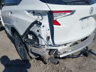 2020 Acura RDX Technology with VIN 5J8TC1H52LL006185, listed as a IAAI auction lot 41457828 with 59,998 mi miles and . Bid and sale history available at DreamBid. Image 19.