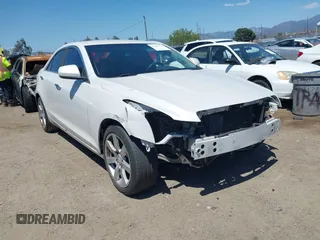 2016 Cadillac ATS Standard RWD with VIN 1G6AA5RA6G0103754, listed as a IAAI auction lot 42223775 with 63,554 mi miles and . Bid and sale history available at DreamBid. Image 1.