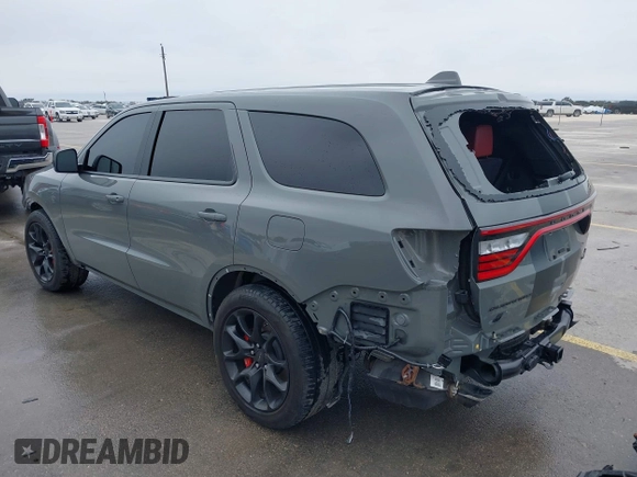 2021 Dodge Durango SRT Hellcat with VIN 1C4SDJH92MC605759, listed as a IAAI auction lot 41639174 with 4,800 mi miles and . Bid and sale history available at DreamBid. Image 3.