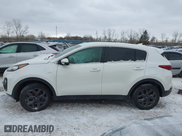 2022 Kia Sportage LX with VIN KNDPMCACXN7983264, listed as a IAAI auction lot 41621970 with 59,237 mi miles and . Bid and sale history available at carsss.com. Image 15.