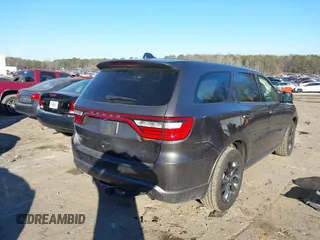 2021 Dodge Durango SXT with VIN 1C4RDHAG1MC824969, listed as a IAAI auction lot 41352831 with 91,188 mi miles and . Bid and sale history available at DreamBid. Image 4.