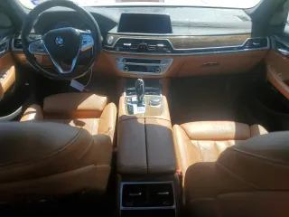 2018 BMW 7 Series 740i xDrive with VIN WBA7E4C52JGV24125, listed as a Copart auction lot 48164214 with 77,695 mi miles. Bid and sale history available at carsss.com. Image 8.