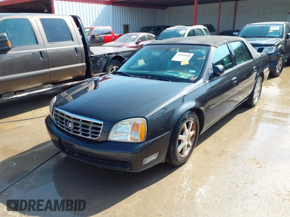 2001 Cadillac DeVille DHS z VIN 1G6KE57YX1U190955, wystawiony jako IAAI lot #41941668 z przebiegiem 191 040 mil mil oraz . Historia ofert i sprzedaży dostępna na DreamBid. Obrazek 2.