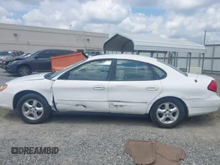 2001 Ford Taurus SES z VIN 1FAFP55U01G285537, wystawiony jako IAAI lot #42213046 z przebiegiem 110 424 mil mil oraz . Historia ofert i sprzedaży dostępna na DreamBid. Obrazek 14.