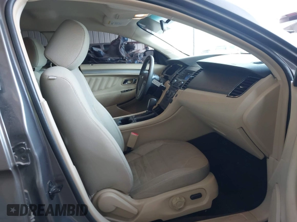 2014 Ford Taurus SE with VIN 1FAHP2D89EG136335, listed as a IAAI auction lot 41880655 with 211,635 mi miles. Bid and sale history available at carsss.com. Image 5.