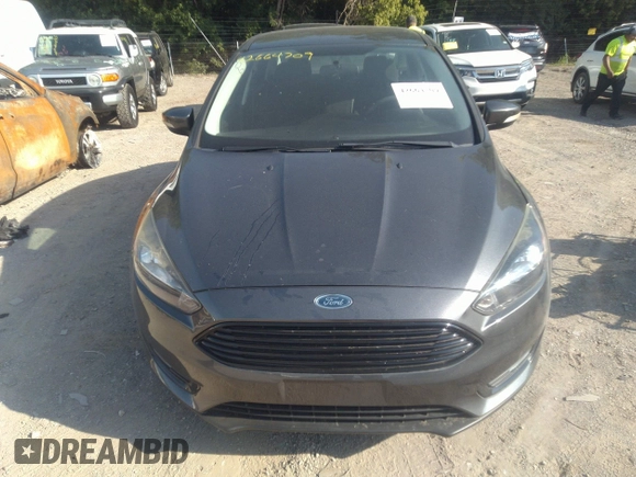 2017 Ford Focus SE with VIN 1FADP3FE3HL295192, listed as a IAAI auction lot 42664709 with 47,589 mi miles and . Bid and sale history available at DreamBid. Image 6.