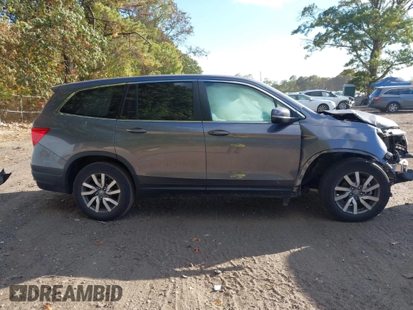 2020 Honda Pilot EX-L z VIN 5FNYF6H53LB069677, wystawiony jako IAAI lot #40581586 z przebiegiem 21 717 mil mil oraz . Historia ofert i sprzedaży dostępna na DreamBid. Obrazek 14.