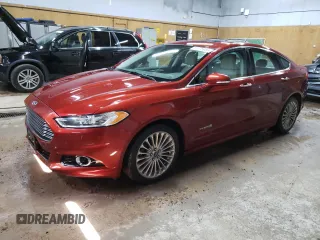 2014 Ford Fusion Titanium Hybrid z VIN 3FA6P0RU6ER219036, wystawiony jako Copart lot #57476985 z przebiegiem 189 113 mil mil oraz Czysty tytuł • Clean title. Historia ofert i sprzedaży dostępna na DreamBid. Obrazek 1.