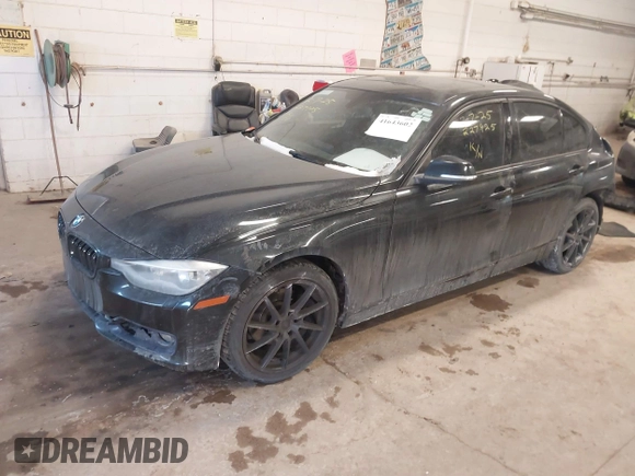 2013 BMW 3 Series 328i xDrive with VIN WBA3B5G57DNS02815, listed as a IAAI auction lot 41643602 with 162,895 mi miles. Bid and sale history available at carsss.com. Image 2.