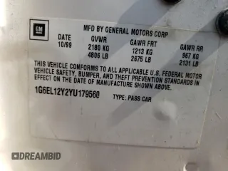 2000 Cadillac Eldorado z VIN 1G6EL12Y2YU179560, wystawiony jako Copart lot #70635784 z przebiegiem 92 959 mil mil oraz Tytuł czysty. Historia ofert i sprzedaży dostępna na DreamBid. Obrazek 12.