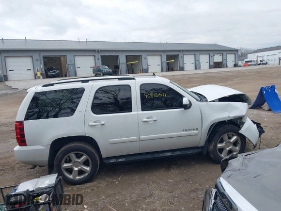 2008 Chevrolet Tahoe LTZ with VIN 1GNFK13098J160218, listed as a IAAI auction lot 40876511 with 186,701 mi miles and . Bid and sale history available at DreamBid. Image 13.
