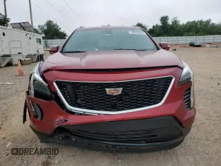 2021 Cadillac XT4 FWD Sport with VIN 1GYFZER49MF082391, listed as a Copart auction lot 56256804 with 24,415 mi miles and Salvage Title. Bid and sale history available at DreamBid. Image 5.