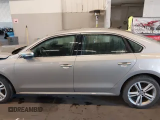 2014 Volkswagen Passat SE z VIN 1VWBN7A36EC064753, wystawiony jako IAAI lot #41221736 z przebiegiem 106 105 mil mil oraz . Historia ofert i sprzedaży dostępna na DreamBid. Obrazek 14.