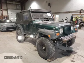 1999 Jeep Wrangler SE with VIN 1J4FY29P4XP457291, listed as a IAAI auction lot 41549758 with 133,362 mi miles and . Bid and sale history available at DreamBid. Image 1.
