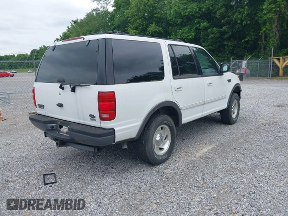 1999 Ford Expedition XLT z VIN 1FMPU18L6XLC34252, wystawiony jako IAAI lot #42314912 z przebiegiem 195 324 mil mil oraz . Historia ofert i sprzedaży dostępna na DreamBid. Obrazek 4.