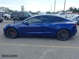 2022 Tesla Model 3 Performance with VIN 5YJ3E1EC1NF296758, listed as a IAAI auction lot 41960443 with 30,754 mi miles. Bid and sale history available at carsss.com. Image 14.
