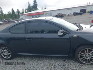 2006 Scion tC z VIN JTKDE177960133014, wystawiony jako IAAI lot #42407196 z przebiegiem 143 448 mil mil oraz . Historia ofert i sprzedaży dostępna na DreamBid. Obrazek 14.