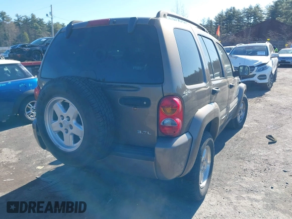 2002 Jeep Liberty Limited with VIN 1J8GL58K82W149287, listed as a IAAI auction lot 41982603 with 154,449 mi miles and . Bid and sale history available at carsss.com. Image 4.