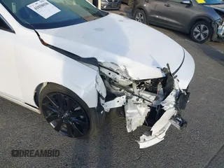 2022 Mazda 3 2.5 Turbo with VIN 3MZBPBAY2NM311824, listed as a IAAI auction lot 41038030 with 21,669 mi miles and . Bid and sale history available at DreamBid. Image 6.
