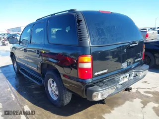 2003 Chevrolet Tahoe LS with VIN 1GNEC13V63R245581, listed as a IAAI auction lot 41599241 with 234,028 mi miles. Bid and sale history available at carsss.com. Image 3.