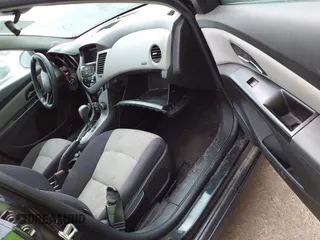 2014 Chevrolet Cruze LS with VIN 1G1PA5SH1E7326487, listed as a IAAI auction lot 42111515 with 126,685 mi miles and . Bid and sale history available at DreamBid. Image 5.