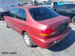 1998 Honda Civic LX with VIN 1HGEJ6671WL032443, listed as a IAAI auction lot 42086174 with 154,881 mi miles. Bid and sale history available at carsss.com. Image 3.