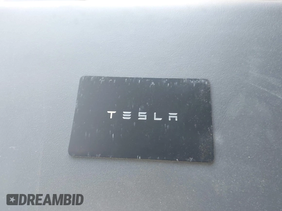 2024 Tesla Model Y with VIN 7SAYGDEDXRA300743, listed as a IAAI auction lot 41690374 with 12,446 mi miles and . Bid and sale history available at DreamBid. Image 11.