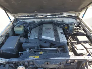2000 Lexus LX 470 z VIN JT6HT00W1Y0096061, wystawiony jako Copart lot #52499155 z przebiegiem 199 914 mil mil oraz Tytuł czysty. Historia ofert i sprzedaży dostępna na DreamBid. Obrazek 12.