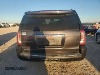 2015 GMC Yukon Denali with VIN 1GKS1CKJ7FR132677, listed as a Copart auction lot 82118584 with 144,798 mi miles and Salvage Title. Bid and sale history available at carsss.com. Image 6.