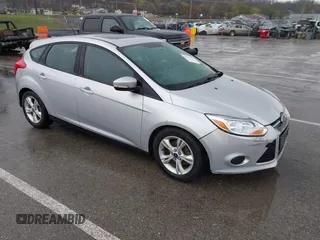 2014 Ford Focus SE with VIN 1FADP3K2XEL277506, listed as a IAAI auction lot 41900240 with 204,989 mi miles. Bid and sale history available at carsss.com. Image 1.