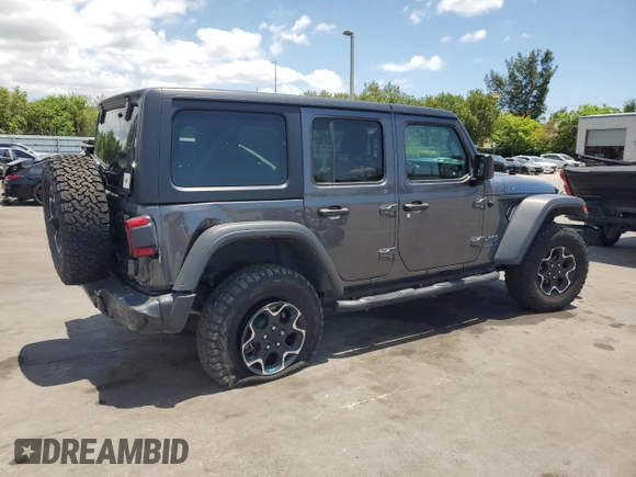 2023 Jeep Wrangler Rubicon z VIN 1C4JJXR65PW557849, wystawiony jako Copart lot #57845705 z przebiegiem 21 849 mil mil oraz Szkoda całkowita • Salvage title. Historia ofert i sprzedaży dostępna na DreamBid. Obrazek 3.