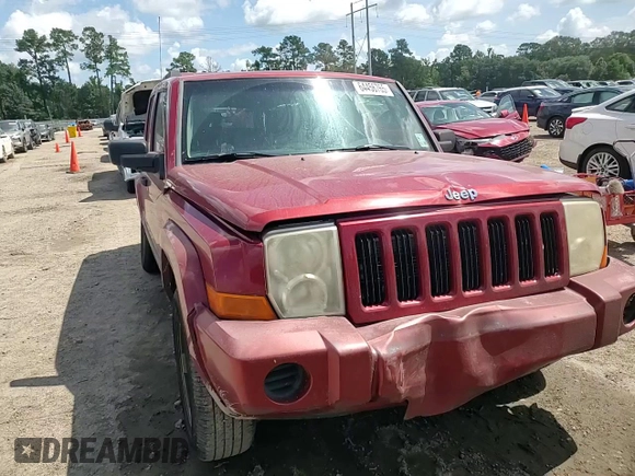 2006 Jeep Commander with VIN 1J8HH48KX6C203308, listed as a Copart auction lot 64456765 with 185,794 mi miles and Salvage title. Bid and sale history available at DreamBid. Image 14.