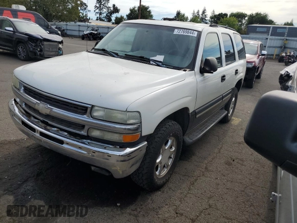2004 Chevrolet Tahoe LS with VIN 1GNEK13V24R279845, listed as a Copart auction lot 72769844 with 374,302 mi miles and Salvage Title. Bid and sale history available at carsss.com. Image 1.