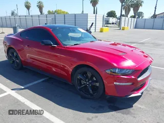 2022 Ford Mustang EcoBoost with VIN 1FA6P8TH0N5129751, listed as a IAAI auction lot 42488873 with 25,571 mi miles and . Bid and sale history available at DreamBid. Image 1.