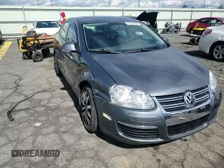 2009 Volkswagen Jetta SE with VIN 3VWRZ71K79M168084, listed as a Copart auction lot 57854825 with 150,986 mi miles and Salvage title. Bid and sale history available at DreamBid. Image 13.