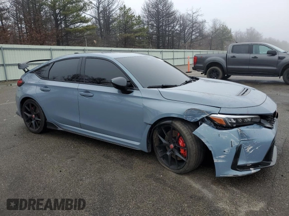 2023 Honda Civic Type R z VIN JHMFL5G40PX003732, wystawiony jako Copart lot #51764935 z przebiegiem 7040 mil mil oraz Szkody całkowita. Historia ofert i sprzedaży dostępna na DreamBid. Obrazek 4.